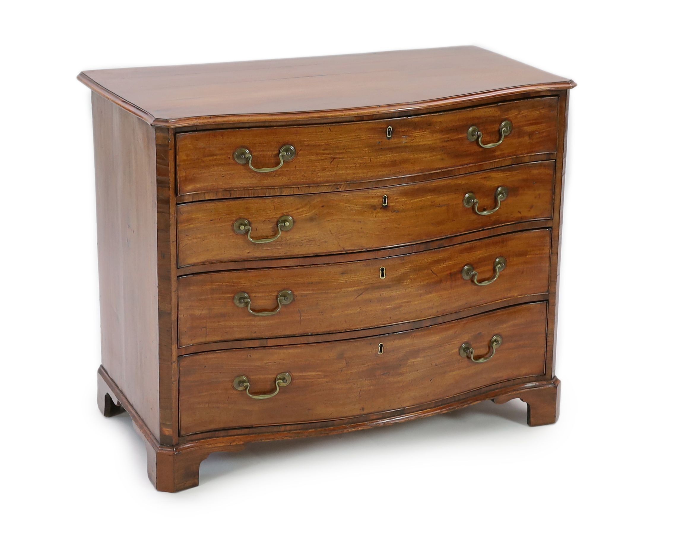 A George III mahogany serpentine dressing chest, W.101cm D.56cm H.84cm